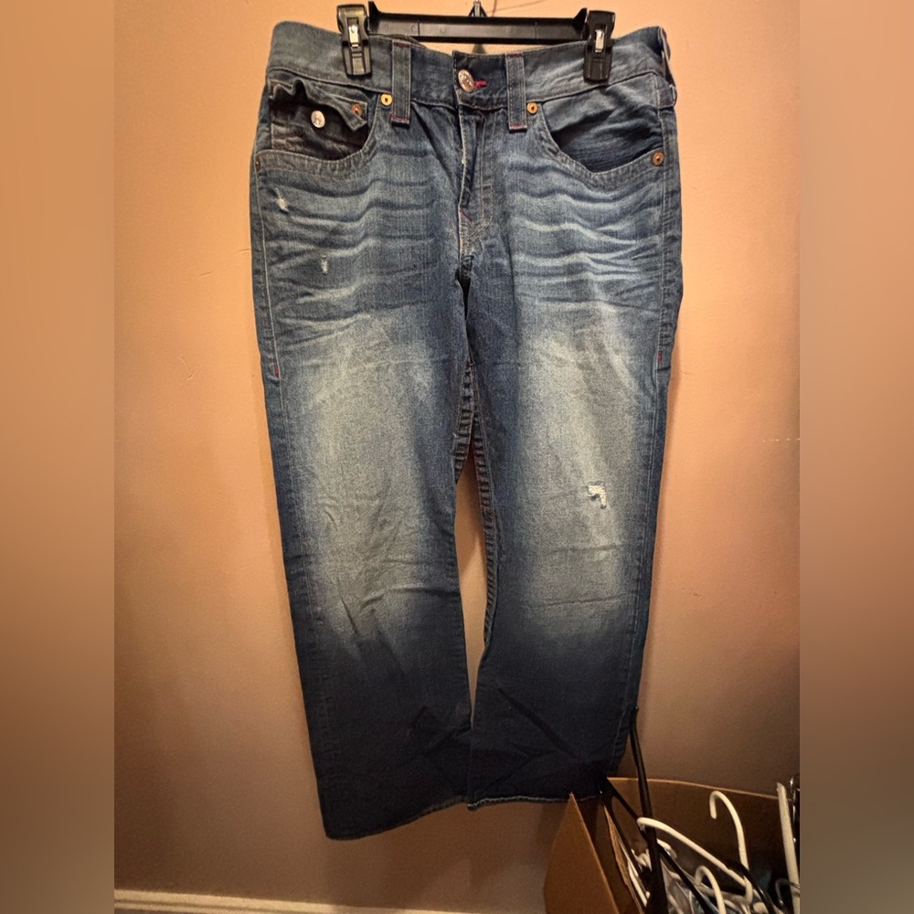 True religion boot cut 34x33 still has hangtag. New distressed blue jeans